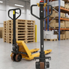 Electric pallet truck with powerful dual-motor drive units and a wireless remote control handle